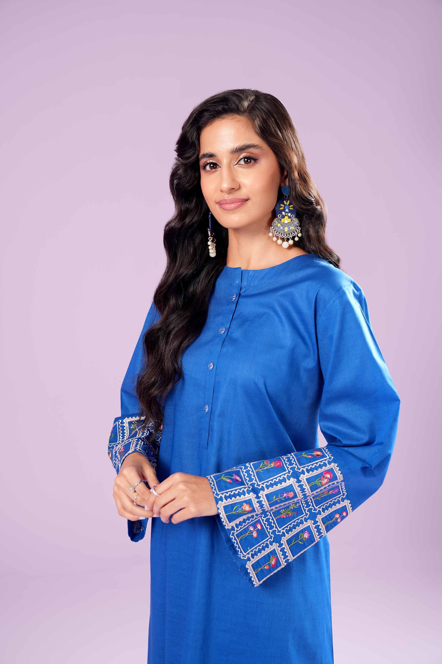 Azure Charm with Embroidered Sleeves
